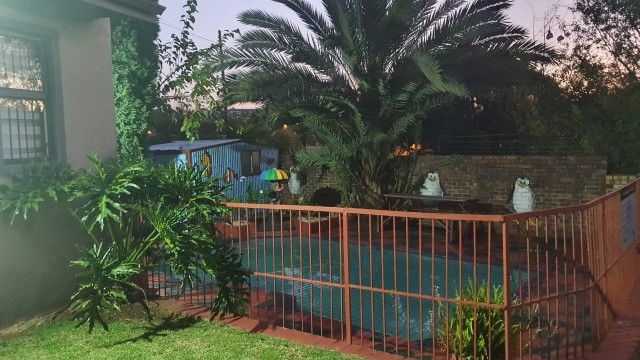 Children engaging in water play at the swimming pool of ChildSol Pre-School near Midrand